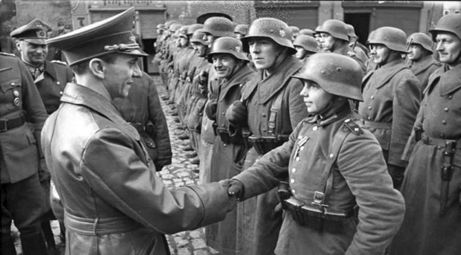Joseph Goebbels congratulates the young Wehrmacht soldier